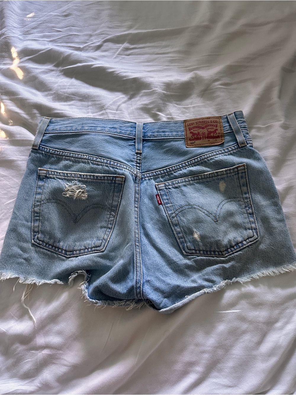 Levi's Light Blue Distressed Denim Cutoff Shorts - Picture 2 of 3